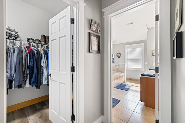 429 Sneaking Creek Dr, Hayesville, NC 28904 - hallway featuring baseboards and light tile patterned floors