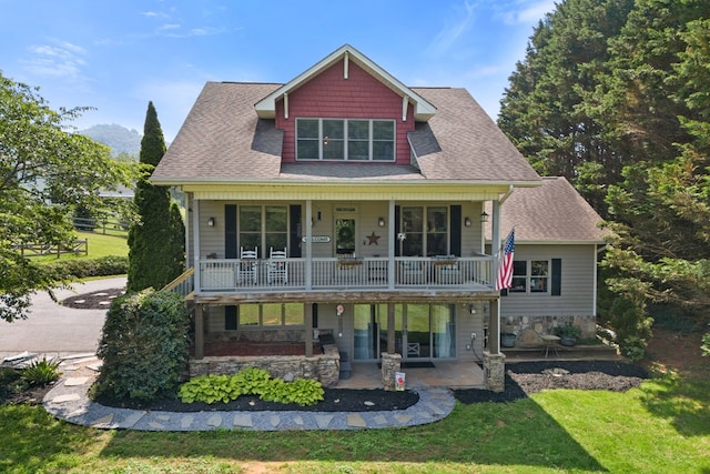 429 Sneaking Creek Dr, Hayesville, NC 28904 - view of front facade featuring a front lawn, a patio, and a shingled roof