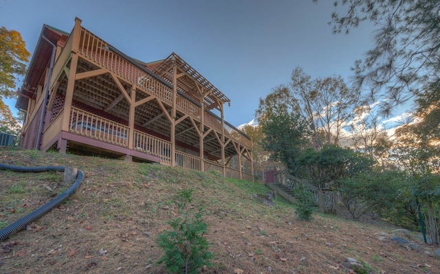 exterior space featuring a wooden deck