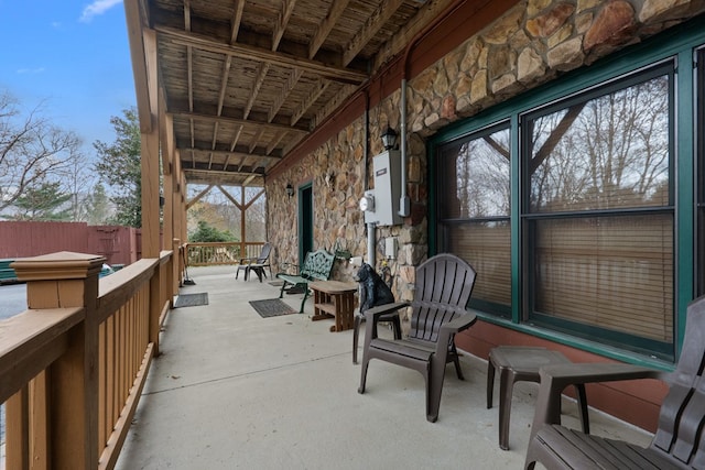 view of patio / terrace featuring fence