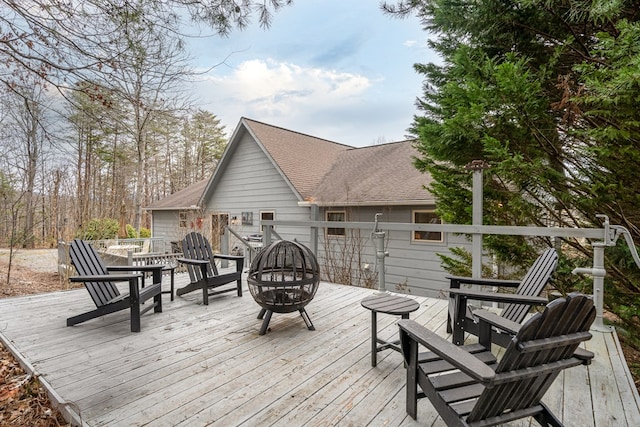 deck featuring a fire pit