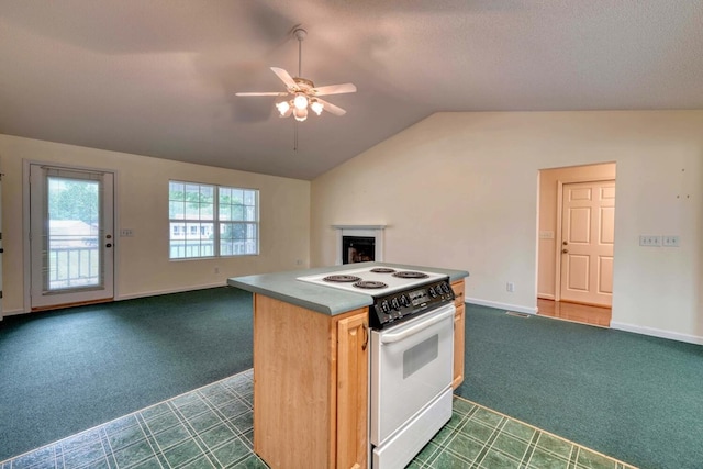 kitchen featuring dark colored carpet, ceiling fan, vaulted ceiling, and electric range