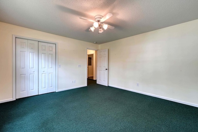 unfurnished bedroom with carpet flooring, ceiling fan, and a closet