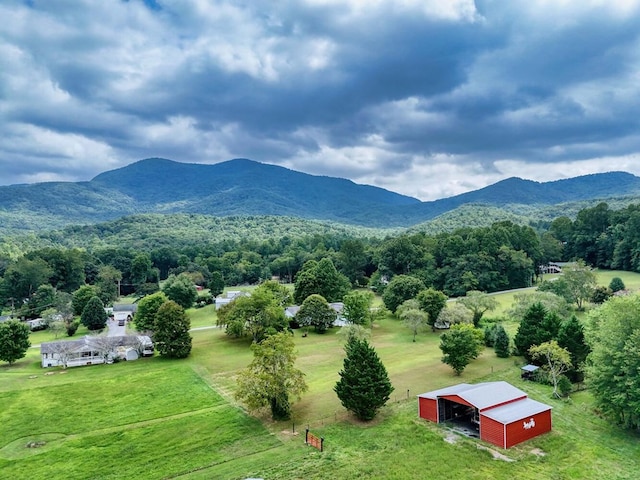 view of mountain feature with a rural view