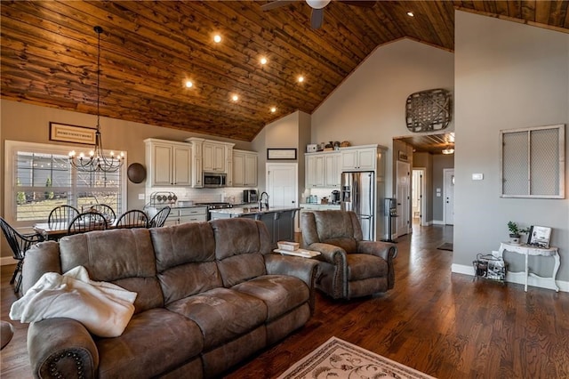 living area featuring baseboards, dark wood finished floors, wood ceiling, high vaulted ceiling, and ceiling fan with notable chandelier