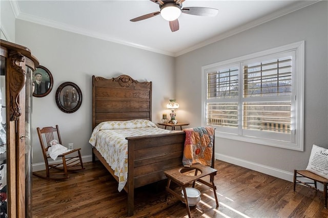 bedroom with baseboards, dark wood finished floors, and crown molding