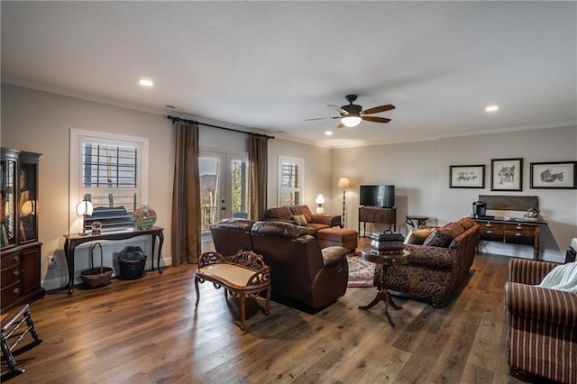 living room featuring ornamental molding, dark wood finished floors, a ceiling fan, and recessed lighting