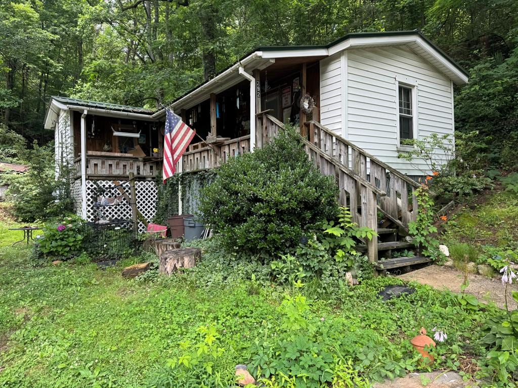 292 Fowler St, East Ellijay, GA 30540 - view of front of house featuring stairs and a porch