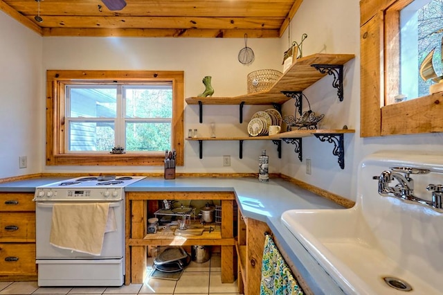 kitchen featuring light tile patterned floors, wooden ceiling, a sink, open shelves, and white range with electric cooktop