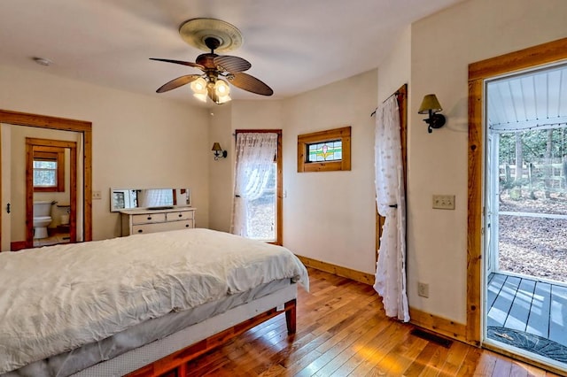 bedroom featuring access to exterior, light wood finished floors, visible vents, a ceiling fan, and baseboards