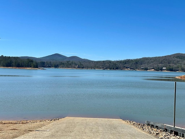 property view of water featuring a mountain view