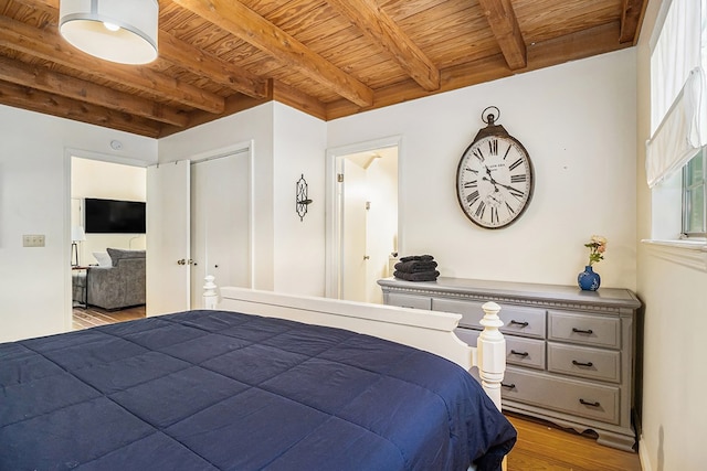 147 Hester Gap Rd, Cleveland, GA 30528 - bedroom with wood ceiling with exposed beams and wood finished floors