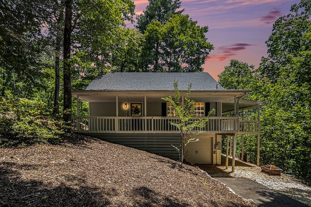 147 Hester Gap Rd, Cleveland, GA 30528 - view of front of home featuring concrete driveway, covered porch, and a garage