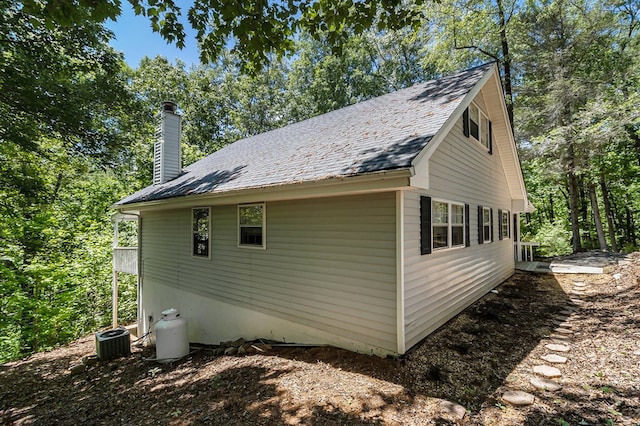 147 Hester Gap Rd, Cleveland, GA 30528 - view of side of property featuring a chimney and central air condition unit