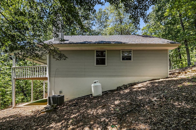 147 Hester Gap Rd, Cleveland, GA 30528 - view of home's exterior featuring central AC and a chimney