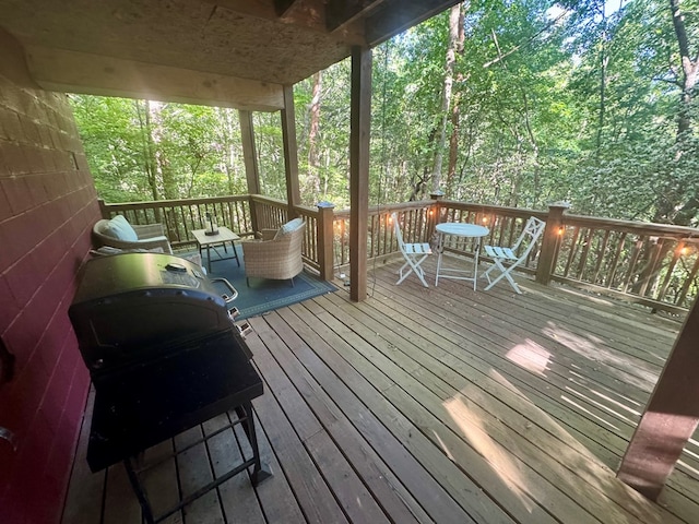 135 Tomahawk Trl, Blue Ridge, GA 30513 - wooden terrace featuring a grill