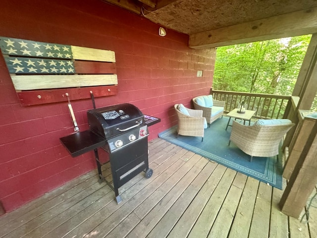 135 Tomahawk Trl, Blue Ridge, GA 30513 - wooden terrace with an outdoor hangout area and a grill
