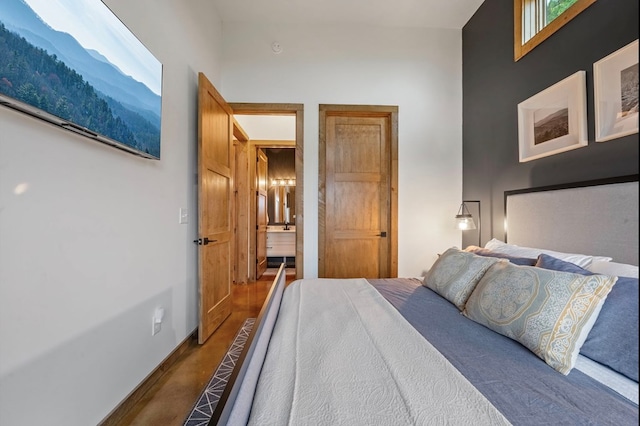 bedroom featuring dark wood-type flooring