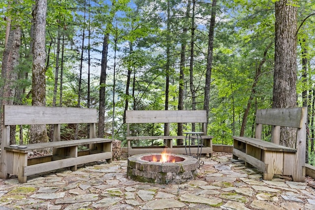 view of patio with an outdoor fire pit