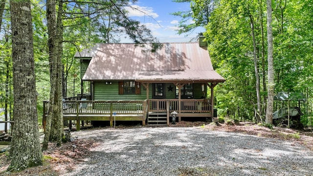 view of front of home with a wooden deck