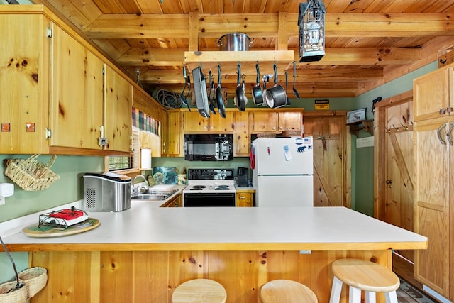 kitchen featuring beamed ceiling, sink, electric range, kitchen peninsula, and white refrigerator