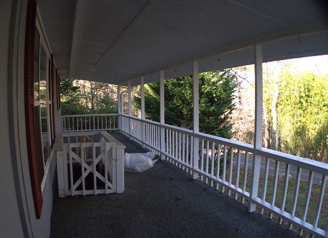 view of patio featuring a porch