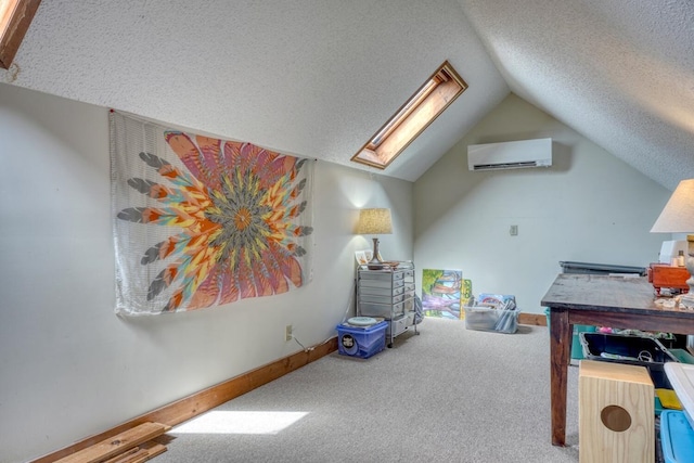 interior space featuring a wall mounted AC, lofted ceiling with skylight, carpet, and a textured ceiling