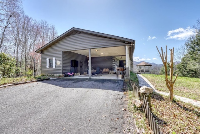 view of front of house featuring a carport