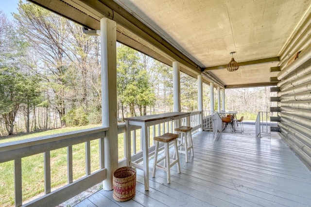 sunroom with plenty of natural light