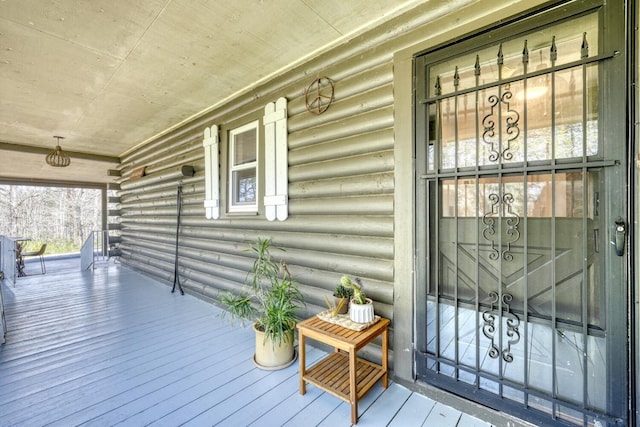 wooden terrace with covered porch