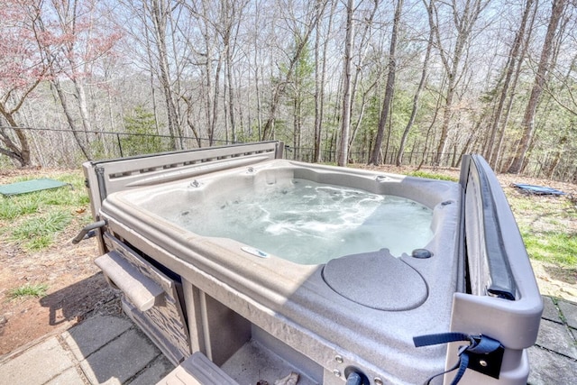 exterior space featuring a hot tub