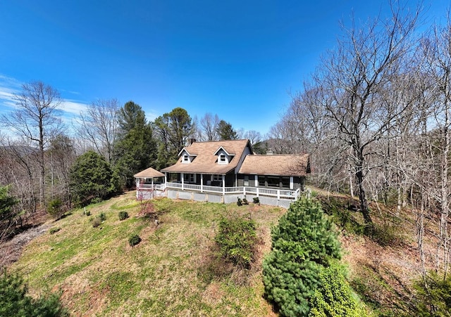 back of house with covered porch