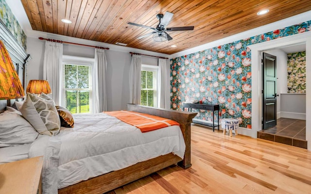 tiled bedroom featuring wooden ceiling and ceiling fan