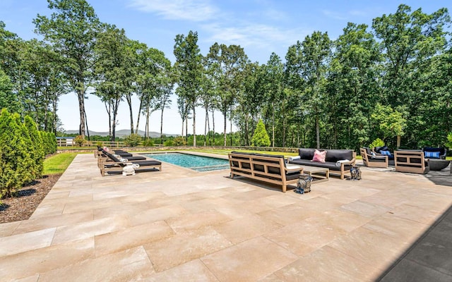 view of swimming pool featuring a patio area and outdoor lounge area