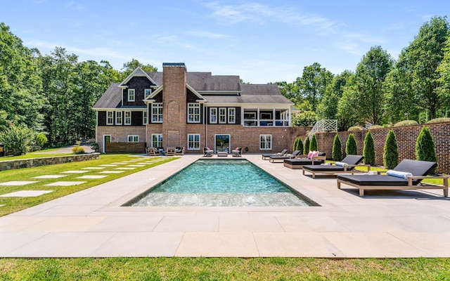 view of pool featuring a patio area