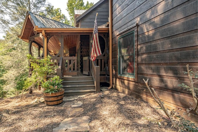 view of home's exterior featuring metal roof