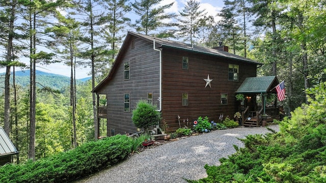 view of side of property featuring a mountain view