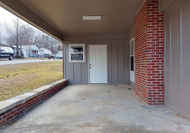 entrance to property with a patio area