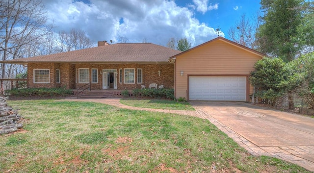 641/638 Timberwood Hills Rd, Murphy, NC 28906 - ranch-style home featuring a chimney, driveway, brick siding, an attached garage, and a front yard