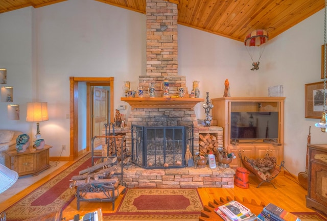 641/638 Timberwood Hills Rd, Murphy, NC 28906 - living room featuring wooden ceiling, baseboards, a stone fireplace, high vaulted ceiling, and wood finished floors