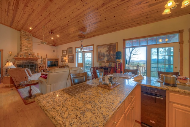 641/638 Timberwood Hills Rd, Murphy, NC 28906 - kitchen featuring vaulted ceiling, a fireplace, light wood-style flooring, wooden ceiling, and open floor plan