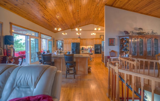 641/638 Timberwood Hills Rd, Murphy, NC 28906 - kitchen featuring vaulted ceiling, light wood-type flooring, wood ceiling, and black appliances