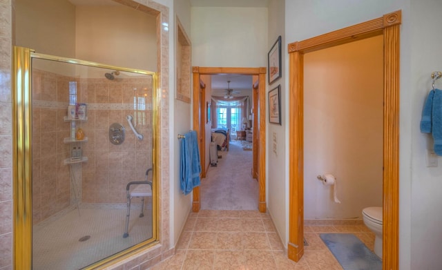 641/638 Timberwood Hills Rd, Murphy, NC 28906 - full bath featuring a ceiling fan, toilet, ensuite bathroom, a shower stall, and tile patterned flooring
