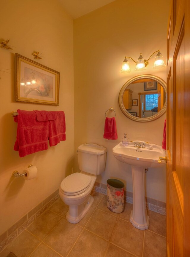 641/638 Timberwood Hills Rd, Murphy, NC 28906 - half bath with tile patterned flooring, toilet, and baseboards