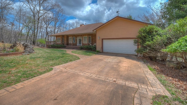 641/638 Timberwood Hills Rd, Murphy, NC 28906 - single story home with an attached garage, a chimney, a front yard, brick siding, and driveway