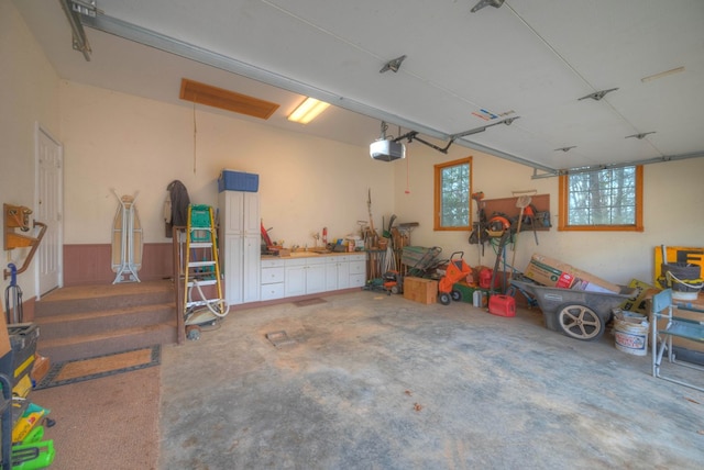 641/638 Timberwood Hills Rd, Murphy, NC 28906 - garage featuring a wainscoted wall and a garage door opener