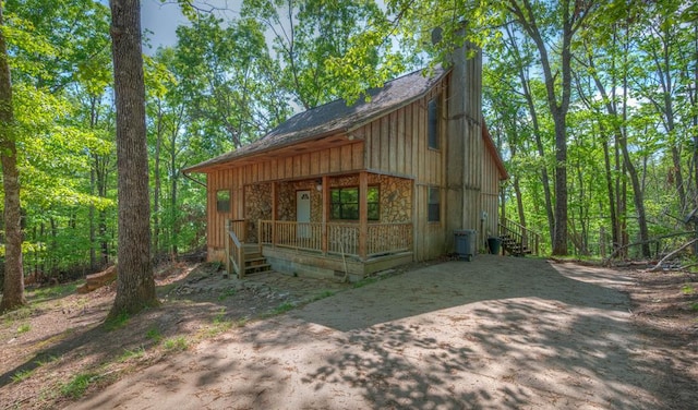641/638 Timberwood Hills Rd, Murphy, NC 28906 - view of outdoor structure featuring concrete driveway and a porch