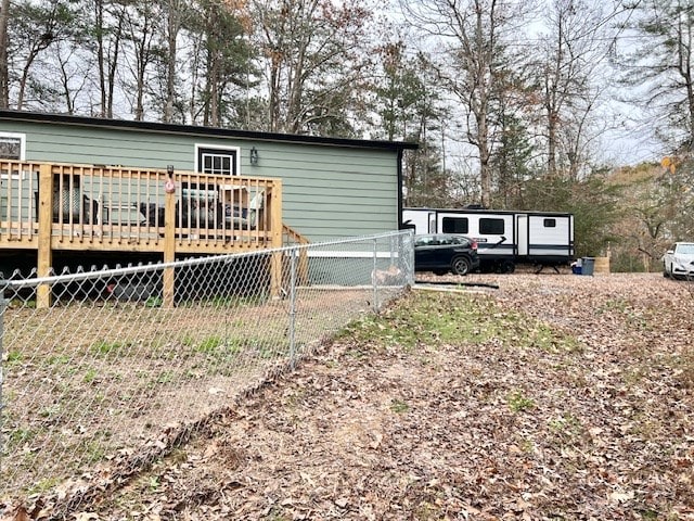 rear view of property with a deck