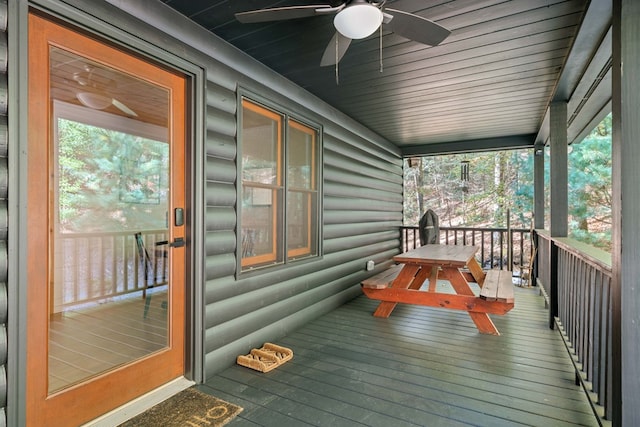 wooden terrace with ceiling fan