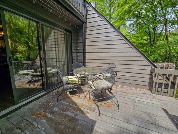 wooden deck with outdoor dining space